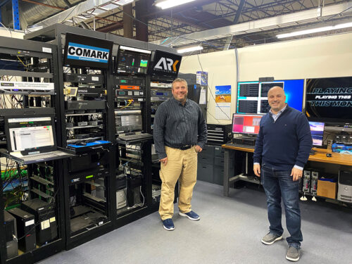 Jason Fiore (left), International Sales and Business Development for Hitachi Kokusai Electric Comark LLC and Joshua Weiss (right), Co-Founder and CEO for ARK Multicasting, Inc. after the successful edge cache last mile test.