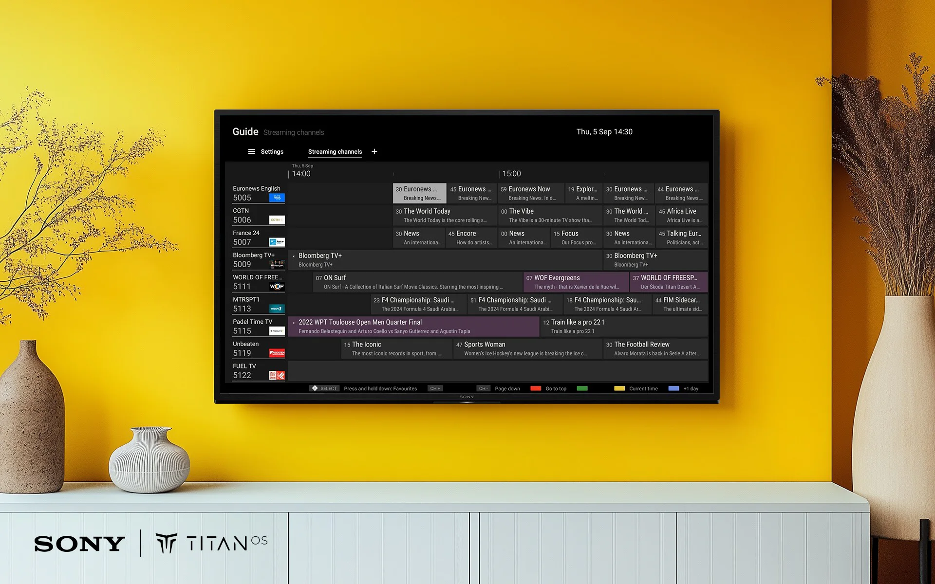 Titan OS TV screen in living room - PR image